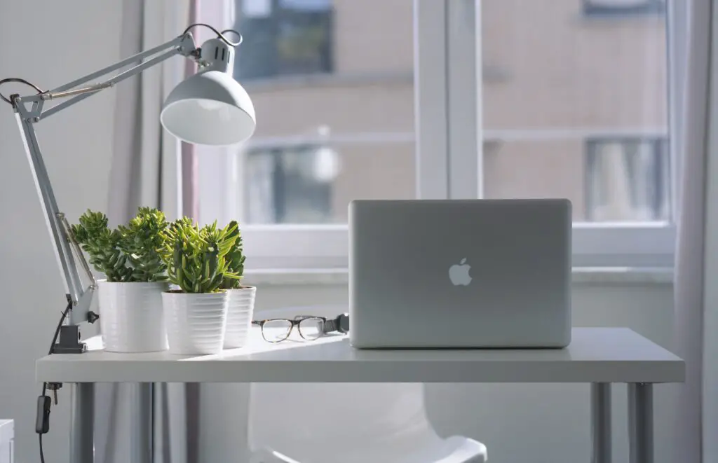 Laptop sitting at work desk